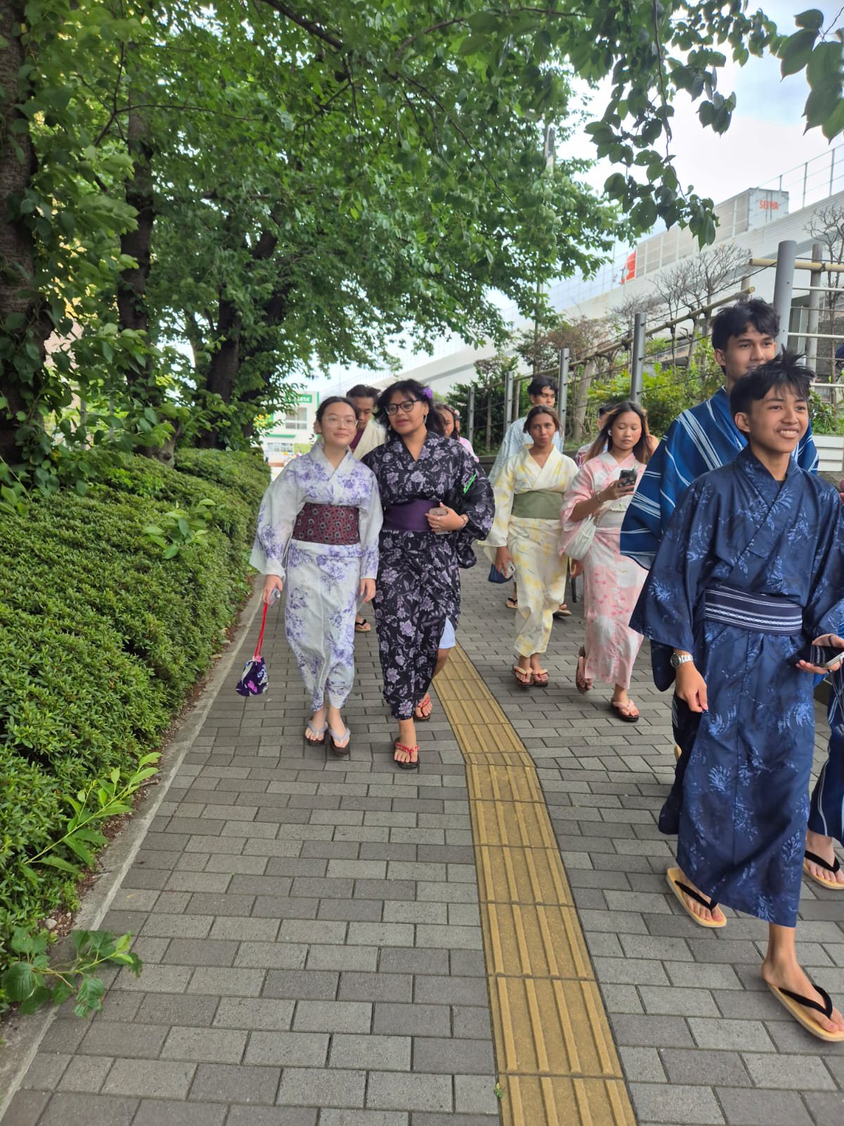YIS students walking through Tokyo in kimono