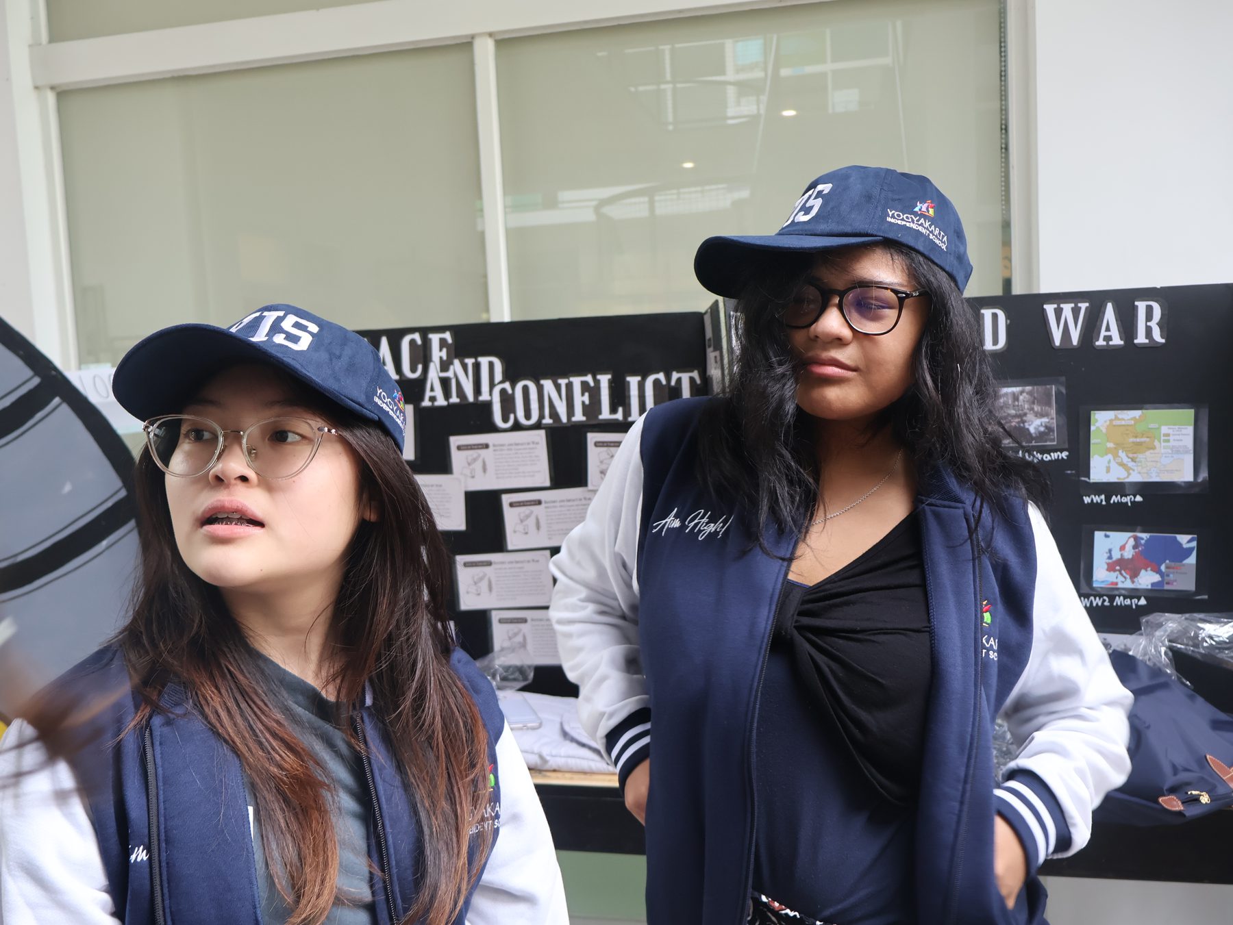 YIS travelers wearing caps and jackets before the Japan journey