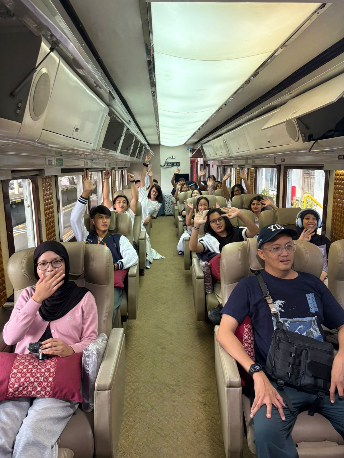 YIS travelers aboard the KA Tambahan Imperial train
